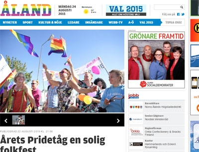 Paikallinen sanomalehti Ålandstidningen vaihtoi verkkosivujensa logon sinisestä sateenkaarenväriseen pride-tapahtuman kunniaksi.